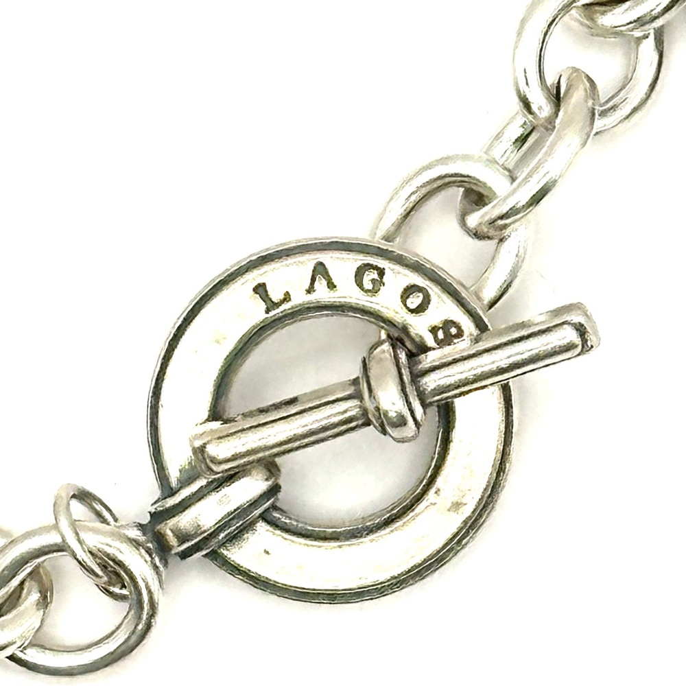 Lagos Caviar Two Tone Silver & 18 Kt Gold Reversible Heart Charm Bracelet - Picture 5 of 9